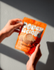 Retail-ready bakery packaging pouch with resealable zipper closure.